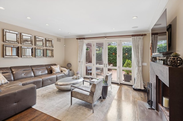 2446 N Janssen Ave, Chicago, IL 60614 - living area featuring wood finished floors, french doors, a fireplace, recessed lighting, and crown molding