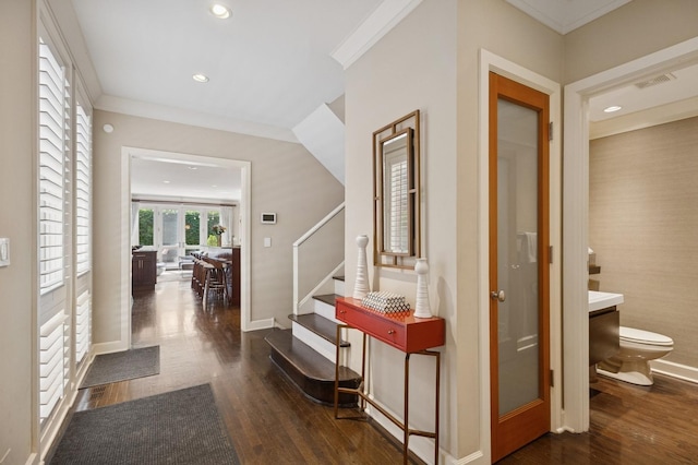 2446 N Janssen Ave, Chicago, IL 60614 - hallway featuring dark wood-type flooring, stairs, crown molding, and recessed lighting