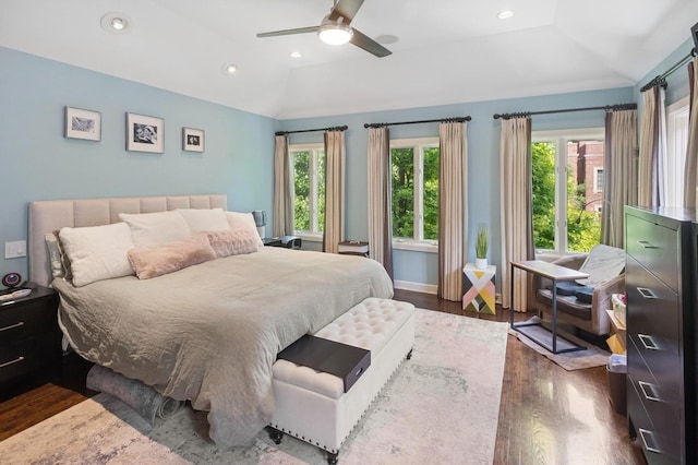 2446 N Janssen Ave, Chicago, IL 60614 - bedroom with vaulted ceiling, multiple windows, wood finished floors, recessed lighting, and a ceiling fan