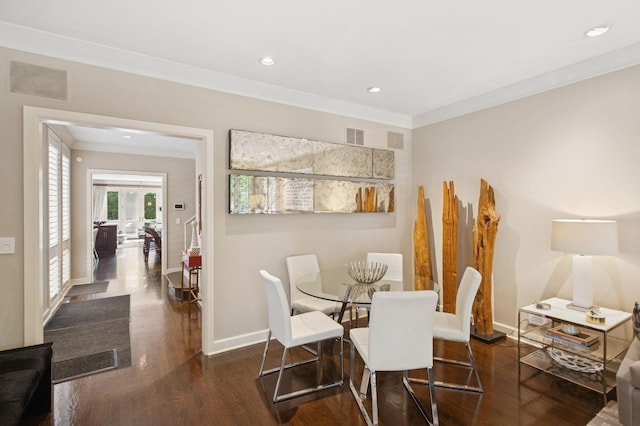 2446 N Janssen Ave, Chicago, IL 60614 - dining room with wood finished floors, ornamental molding, and recessed lighting