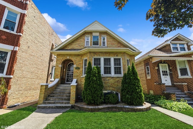 1325 Gunderson Ave, Berwyn, IL 60402 - view of front facade with a front lawn and brick siding
