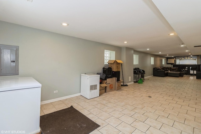 1325 Gunderson Ave, Berwyn, IL 60402 - below grade area with electric panel, fridge, and recessed lighting