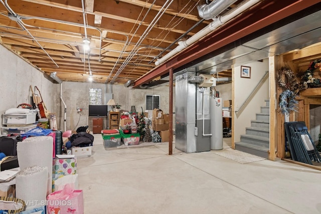 3716 King Charles Ln, Saint Charles, IL 60174 - unfinished below grade area featuring water heater, stairs, and heating unit