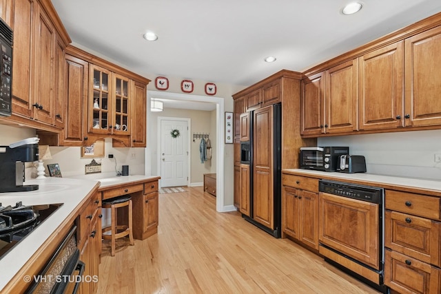 3716 King Charles Ln, Saint Charles, IL 60174 - kitchen with black appliances, brown cabinetry, light countertops, and recessed lighting