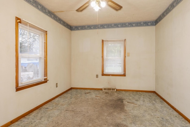 607 W Grant Ave, Pontiac, IL 61764 - carpeted empty room with ceiling fan and baseboards