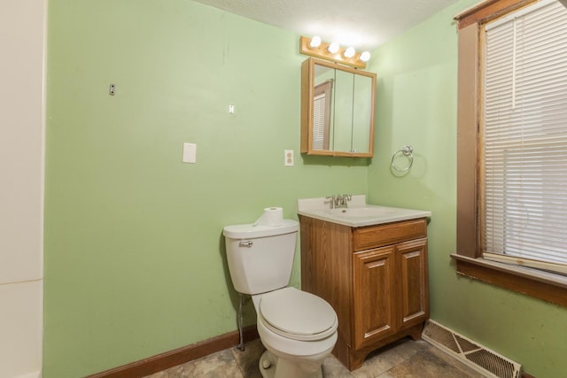 607 W Grant Ave, Pontiac, IL 61764 - bathroom with toilet and vanity