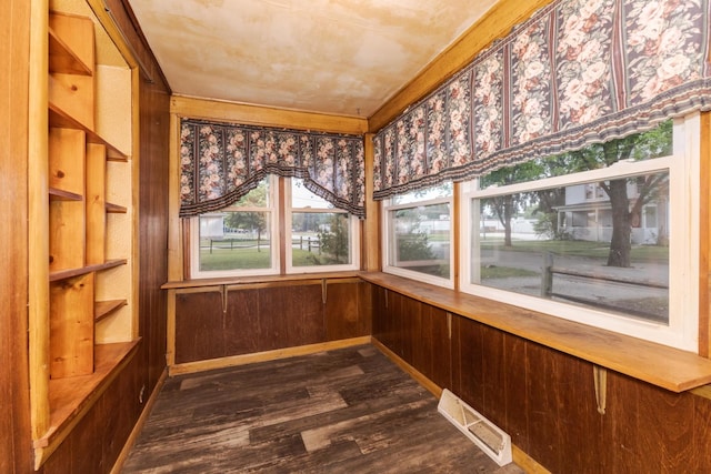 607 W Grant Ave, Pontiac, IL 61764 - unfurnished sunroom featuring wood finished floors and wood walls