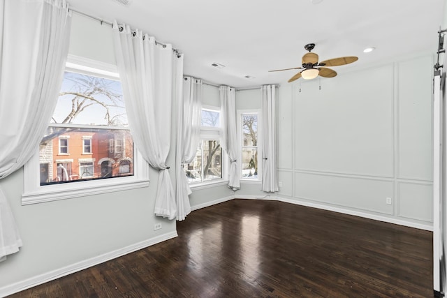 4738 S Champlain Ave, Chicago, IL 60615 - unfurnished room featuring a ceiling fan and wood finished floors