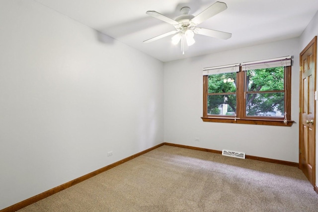 584 Beaconsfield Ave, Naperville, IL 60565 - unfurnished room with light colored carpet and a ceiling fan