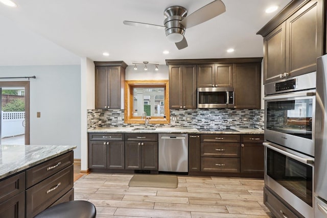 584 Beaconsfield Ave, Naperville, IL 60565 - kitchen with stainless steel appliances, a ceiling fan, dark brown cabinetry, and recessed lighting