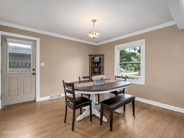 0S544 E St, Winfield, IL 60190 - dining space with light wood-type flooring and ornamental molding