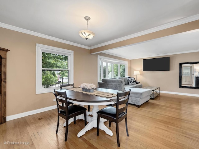 0S544 E St, Winfield, IL 60190 - dining room featuring light wood finished floors and crown molding