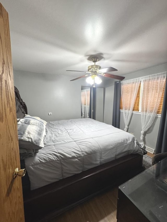14240 S Manistee Ave, Burnham, IL 60633 - bedroom with a ceiling fan and wood finished floors