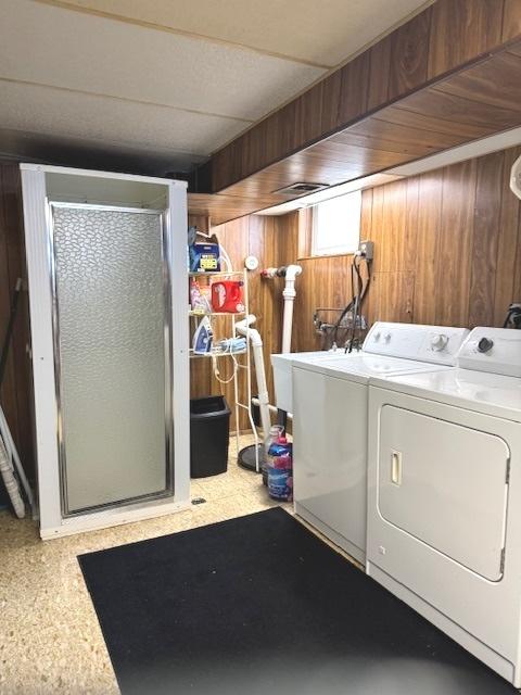 14240 S Manistee Ave, Burnham, IL 60633 - laundry room featuring wood walls and washer and clothes dryer