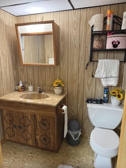 14240 S Manistee Ave, Burnham, IL 60633 - half bath featuring vanity and wooden walls
