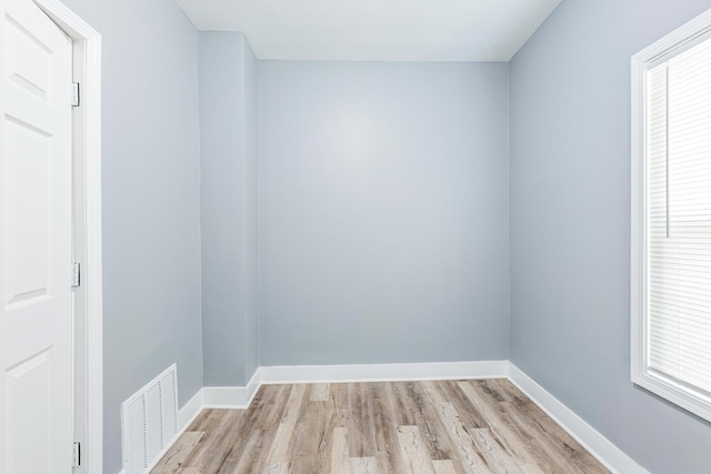 12452 S Eggleston Ave, Chicago, IL 60628 - spare room with light wood-type flooring and baseboards