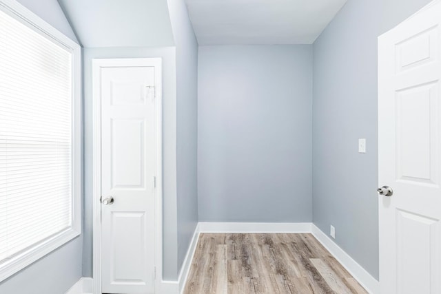 12452 S Eggleston Ave, Chicago, IL 60628 - hall with light wood-style floors and baseboards