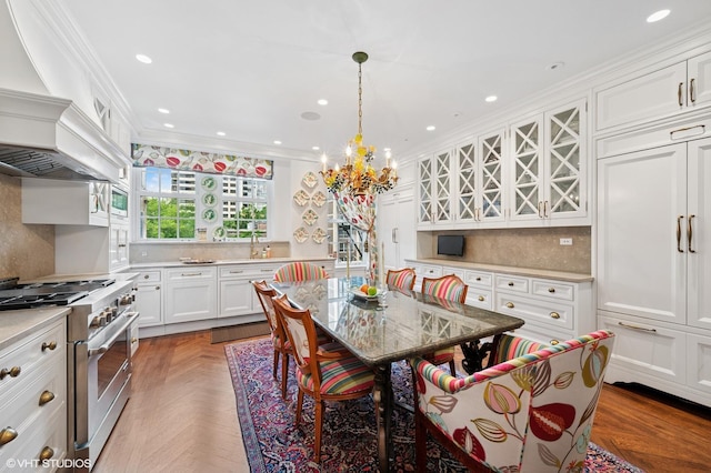1500 N Lake Shore Dr Unit 5B, Chicago, IL 60610 - dining area with a chandelier, ornamental molding, and recessed lighting