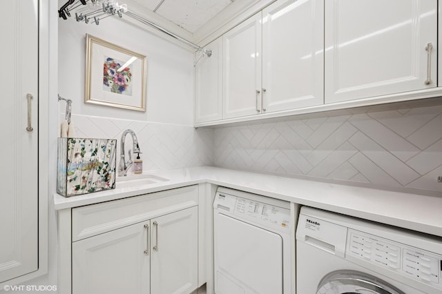 1500 N Lake Shore Dr Unit 5B, Chicago, IL 60610 - laundry room featuring independent washer and dryer and cabinet space