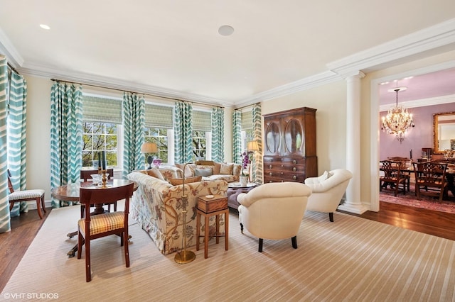 1500 N Lake Shore Dr Unit 5B, Chicago, IL 60610 - living room with a chandelier, crown molding, decorative columns, and wood finished floors