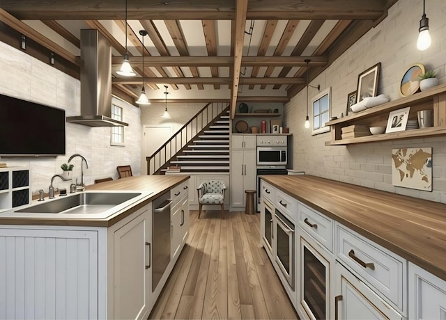 120 Madera Cir, Carpentersville, IL 60110 - kitchen with butcher block countertops, island exhaust hood, open shelves, white microwave, and beam ceiling