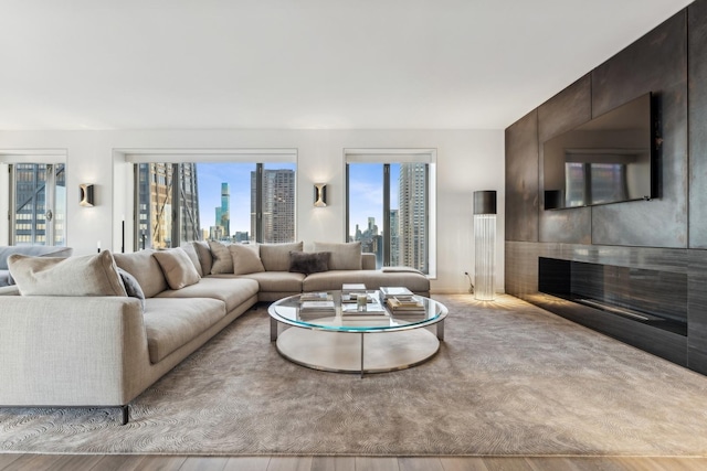 950 N Michigan Ave Unit 4306, Chicago, IL 60611 - living area featuring a large fireplace and wood finished floors