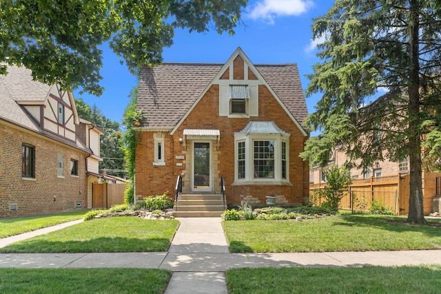 1710 N 74th Ct, Elmwood Park, IL 60707 - english style home with brick siding and roof with shingles