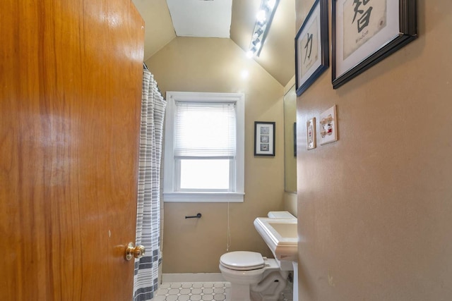 1710 N 74th Ct, Elmwood Park, IL 60707 - bathroom with curtained shower and lofted ceiling