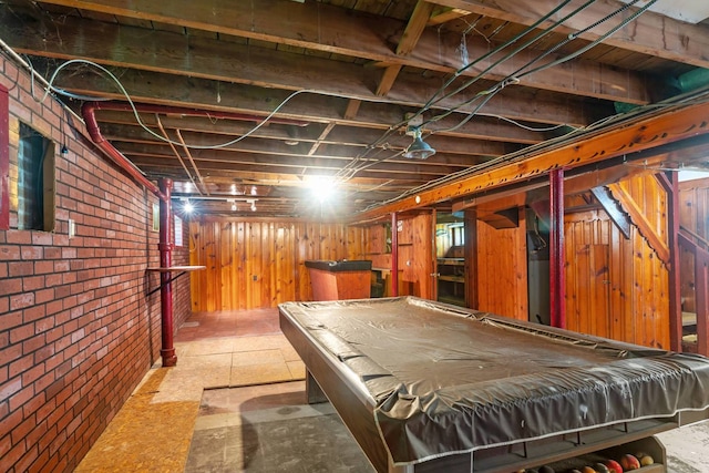 1710 N 74th Ct, Elmwood Park, IL 60707 - playroom featuring brick wall, wood walls, billiards, and tile patterned floors