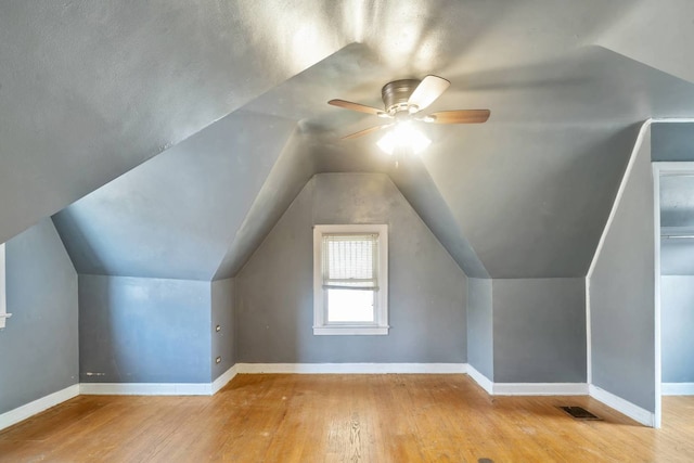 1710 N 74th Ct, Elmwood Park, IL 60707 - additional living space featuring wood-type flooring, a ceiling fan, and vaulted ceiling