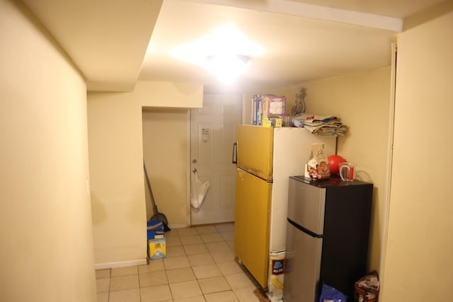 6948 S Eberhart Ave, Chicago, IL 60637 - kitchen featuring freestanding refrigerator and light tile patterned floors