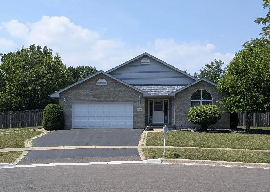 656 Sedge Meadow Ct, Romeoville, IL 60446 - single story home featuring asphalt driveway, an attached garage, and brick siding