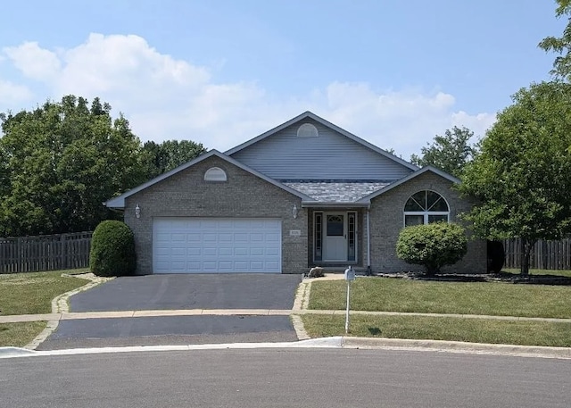 656 Sedge Meadow Ct, Romeoville, IL 60446 - single story home featuring asphalt driveway, an attached garage, and brick siding