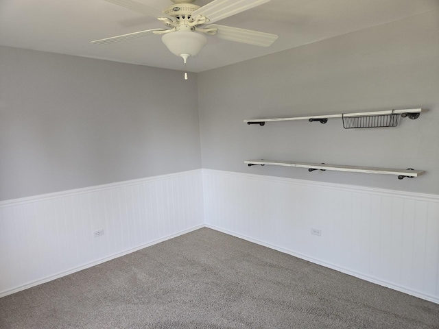 8452 Dunmore Dr, Tinley Park, IL 60487 - empty room featuring a wainscoted wall, a ceiling fan, and carpet floors