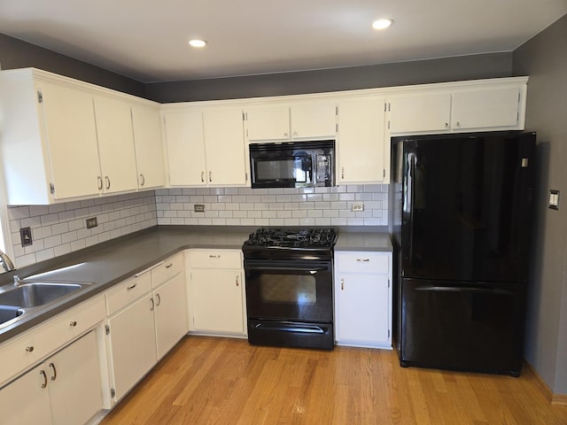 8452 Dunmore Dr, Tinley Park, IL 60487 - kitchen with black appliances, light wood-style floors, white cabinetry, tasteful backsplash, and recessed lighting