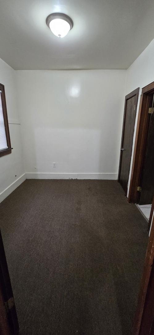 83 W 15th St, Chicago Heights, IL 60411 - empty room featuring dark colored carpet