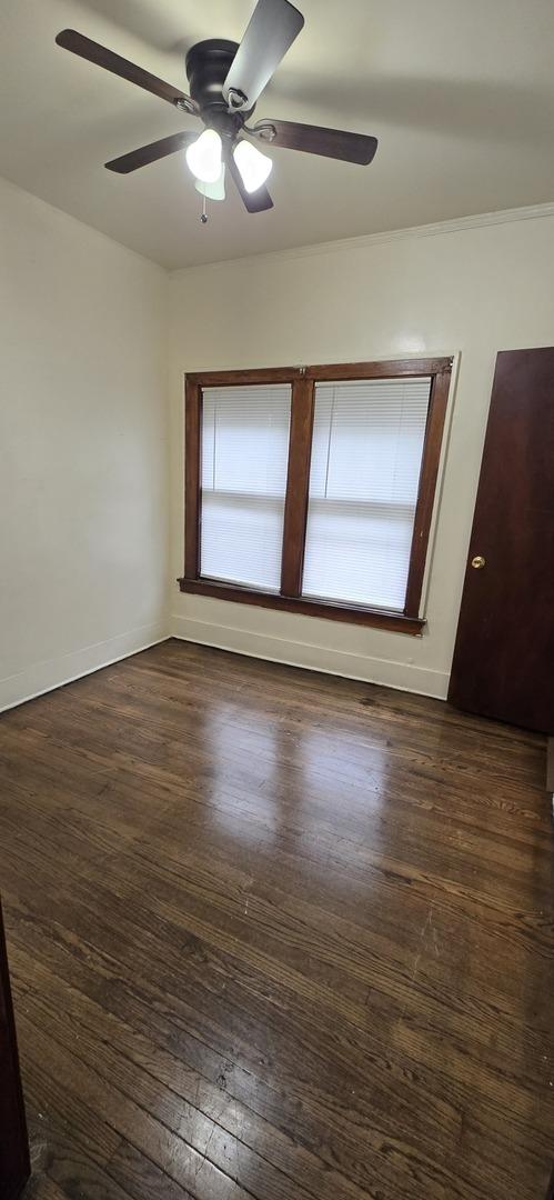 83 W 15th St, Chicago Heights, IL 60411 - unfurnished room featuring a ceiling fan and hardwood / wood-style flooring