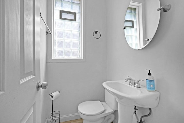 6409 S Champlain Ave, Chicago, IL 60637 - bathroom featuring toilet and baseboards