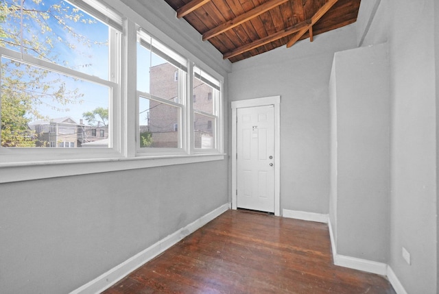 6409 S Champlain Ave, Chicago, IL 60637 - unfurnished room featuring a wooden ceiling with exposed beams and wood finished floors