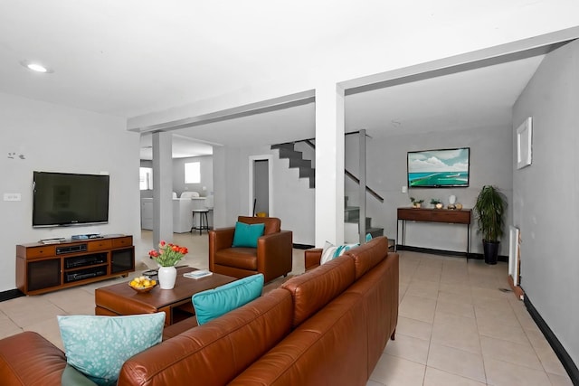 6409 S Champlain Ave, Chicago, IL 60637 - living area with light tile patterned floors, stairs, and recessed lighting
