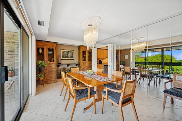 1671 Mission Hills Rd Unit 501, Northbrook, IL 60062 - dining space with a chandelier and light tile patterned floors