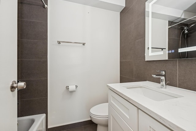 330 W Diversey Pkwy Unit 2306, Chicago, IL 60657 - bathroom with vanity, tile walls, shower / bath combination, decorative backsplash, and tile patterned floors