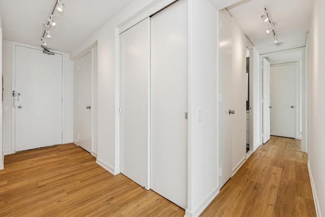 330 W Diversey Pkwy Unit 2306, Chicago, IL 60657 - hallway with rail lighting and light wood-type flooring