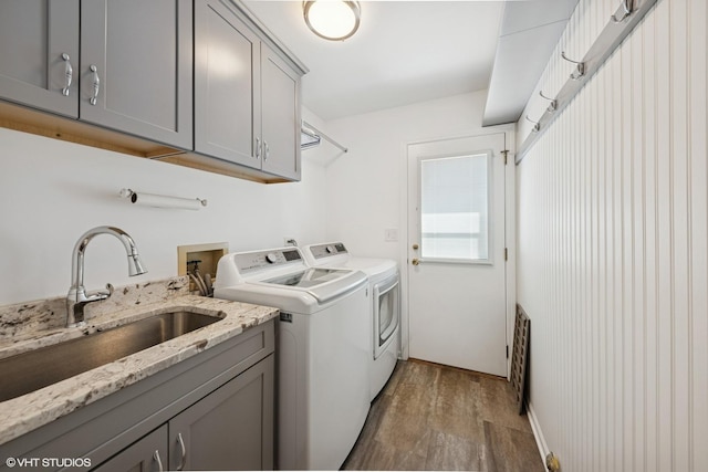 1885 Mcrae Ln, Mundelein, IL 60060 - washroom featuring washer and clothes dryer, wood finished floors, and cabinet space