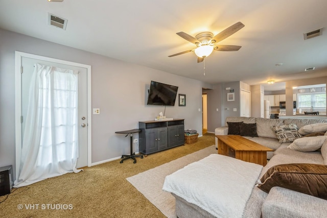 285 Sheffield Dr, Schaumburg, IL 60194 - living area featuring light colored carpet and a ceiling fan