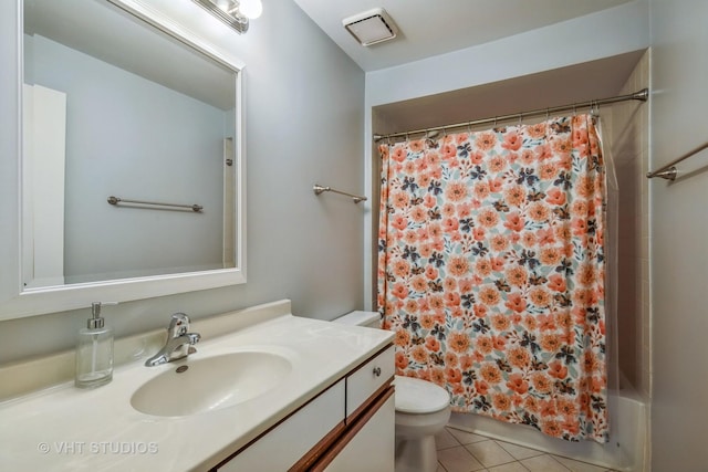 285 Sheffield Dr, Schaumburg, IL 60194 - bathroom featuring vanity, tile patterned floors, and shower / bath combination with curtain