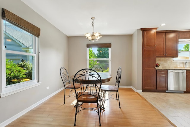 920 Matthew Ct, Naperville, IL 60540 - dining room with plenty of natural light, light wood-style flooring, a chandelier, and recessed lighting