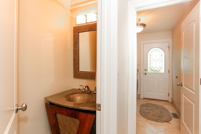 560 81st St, Burr Ridge, IL 60527 - entryway with light tile patterned floors