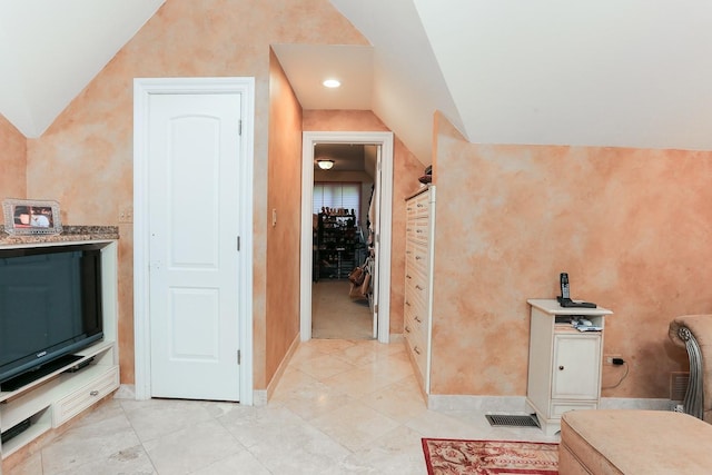 560 81st St, Burr Ridge, IL 60527 - hallway featuring vaulted ceiling and baseboards