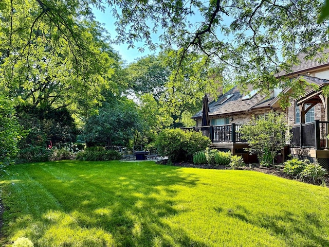 560 81st St, Burr Ridge, IL 60527 - view of green lawn featuring a deck